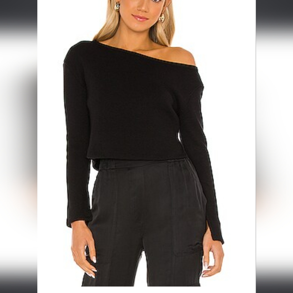 Off shoulder black sweater with wrist slit